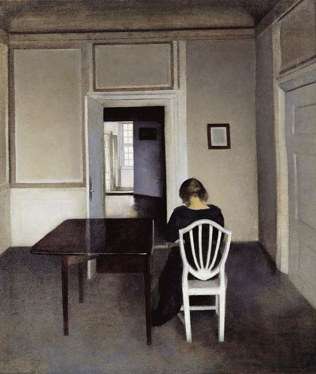 interior with ida in a white chair by vilhelm hammershøi