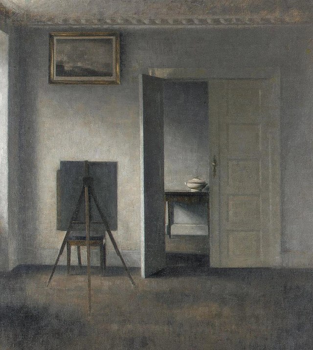 interior with the artist's easel by vilhelm hammershøi